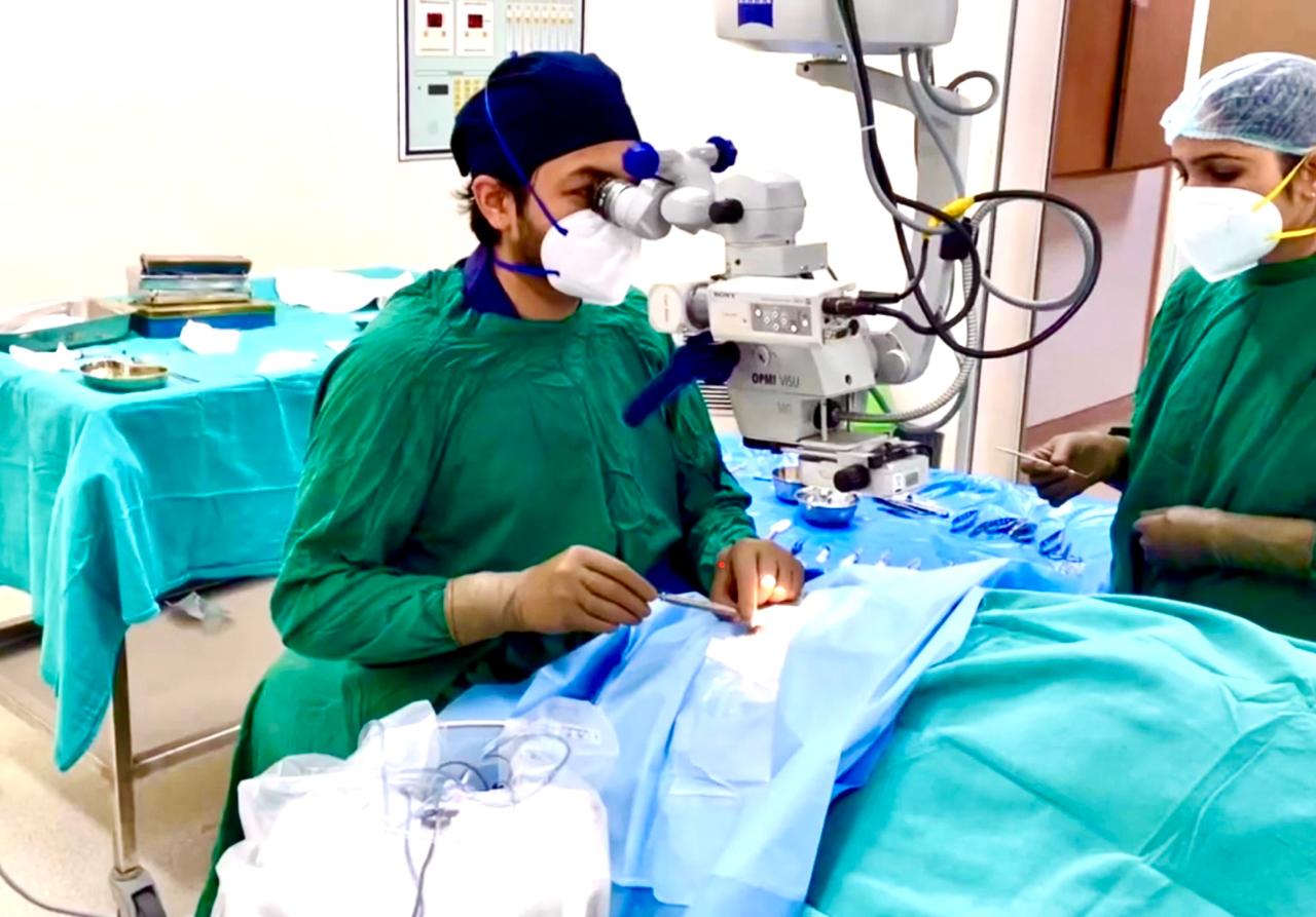 Dr. Bansal consulting a patient